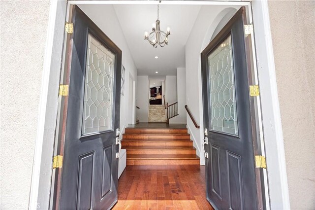 2421 N Feather Hill Dr, Orange, CA 92867 - entryway with a chandelier, wood finished floors, stairs, and recessed lighting