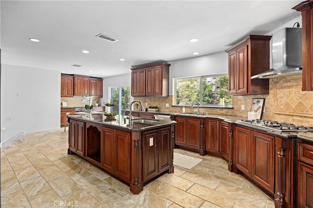 2421 N Feather Hill Dr, Orange, CA 92867 - kitchen with wall chimney exhaust hood, a sink, stainless steel gas stovetop, recessed lighting, and backsplash