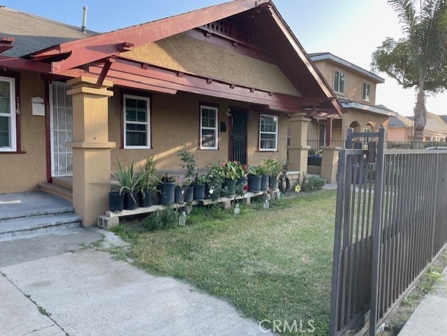 714 E 2nd St, Santa Ana, CA 92701 - view of side of property featuring stucco siding