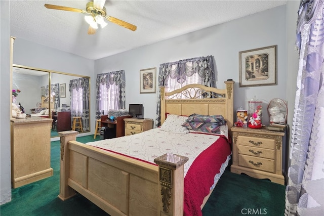 9637 San Carlos Ave, South Gate, CA 90280 - bedroom with carpet flooring, a textured ceiling, a closet, and a ceiling fan