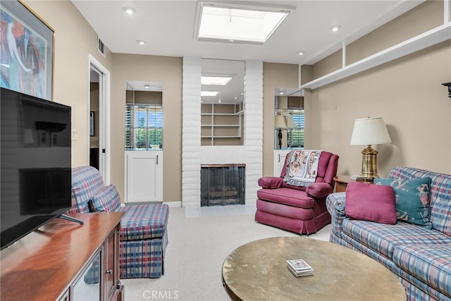 17 Toledo Dr, Rancho Mirage, CA 92270 - living area with carpet floors, a fireplace, and recessed lighting