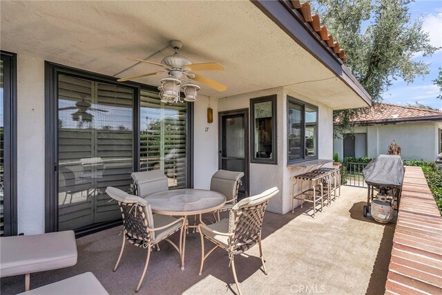 17 Toledo Dr, Rancho Mirage, CA 92270 - view of patio / terrace with ceiling fan and outdoor dining space