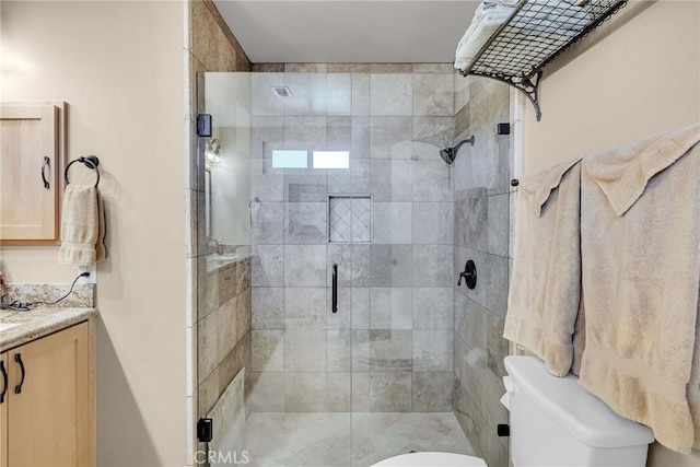 17 Toledo Dr, Rancho Mirage, CA 92270 - bathroom featuring toilet, vanity, and a stall shower