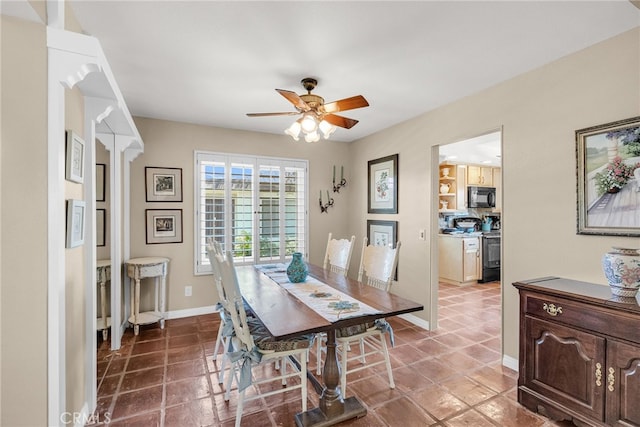 17 Toledo Dr, Rancho Mirage, CA 92270 - tiled dining room with a ceiling fan and baseboards