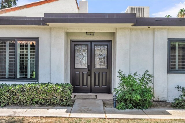 17 Toledo Dr, Rancho Mirage, CA 92270 - property entrance featuring stucco siding