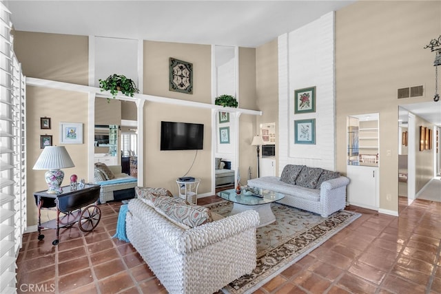 17 Toledo Dr, Rancho Mirage, CA 92270 - living area featuring a high ceiling and baseboards