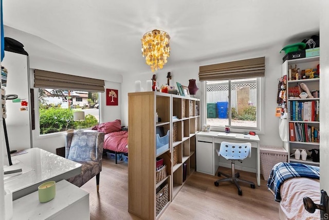 1738 33rd St, San Diego, CA 92102 - bedroom featuring light wood-style floors, a chandelier, and a desk
