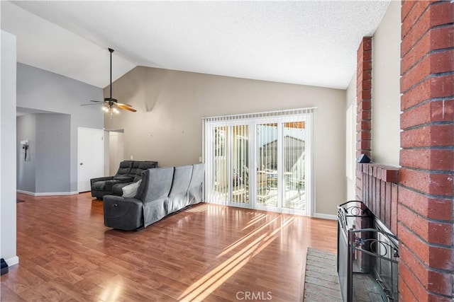 3611 Jupiter Ave, Palmdale, CA 93550 - living area with wood finished floors, lofted ceiling, a ceiling fan, and baseboards
