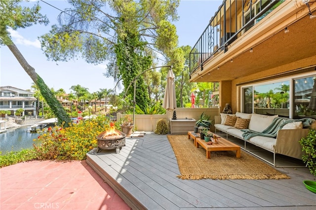 24311 Canyon Lake Dr N Unit 12, Canyon Lake, CA 92587 - wooden deck with an outdoor living space with a fire pit