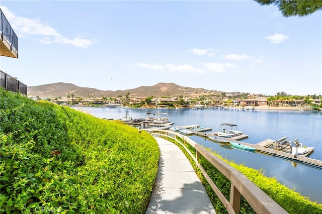 24311 Canyon Lake Dr N Unit 12, Canyon Lake, CA 92587 - water view with a boat dock and a mountainous background