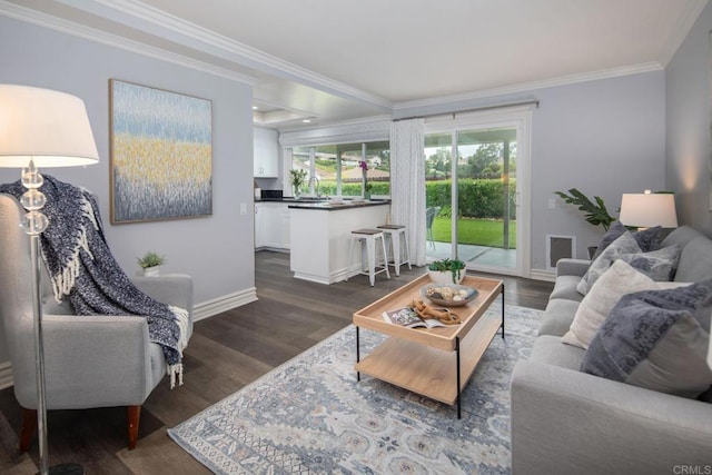 16182 Selva Dr, San Diego, CA 92128 - living area with ornamental molding, baseboards, and dark wood finished floors