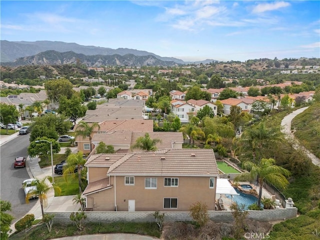 25605 Wordsworth Ln, Stevenson Ranch, CA 91381 - aerial view of residential area with a mountain backdrop