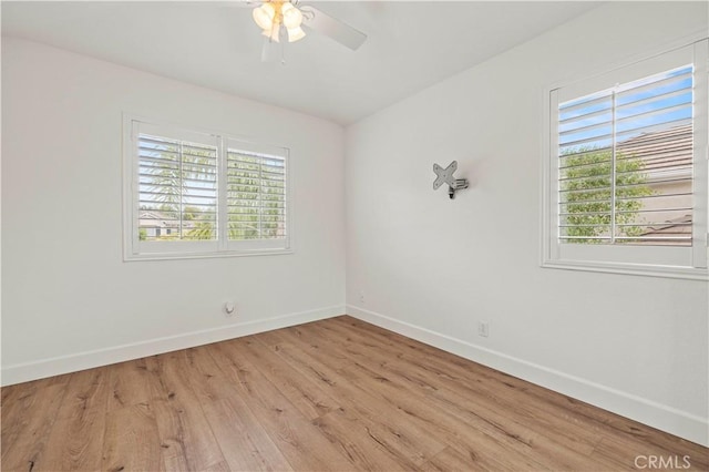 25605 Wordsworth Ln, Stevenson Ranch, CA 91381 - empty room featuring baseboards, wood finished floors, and a ceiling fan