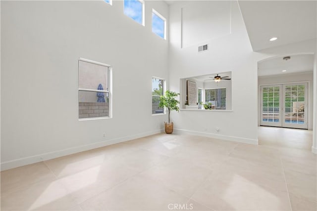 25605 Wordsworth Ln, Stevenson Ranch, CA 91381 - spare room featuring plenty of natural light, ceiling fan, baseboards, tile patterned floors, and recessed lighting