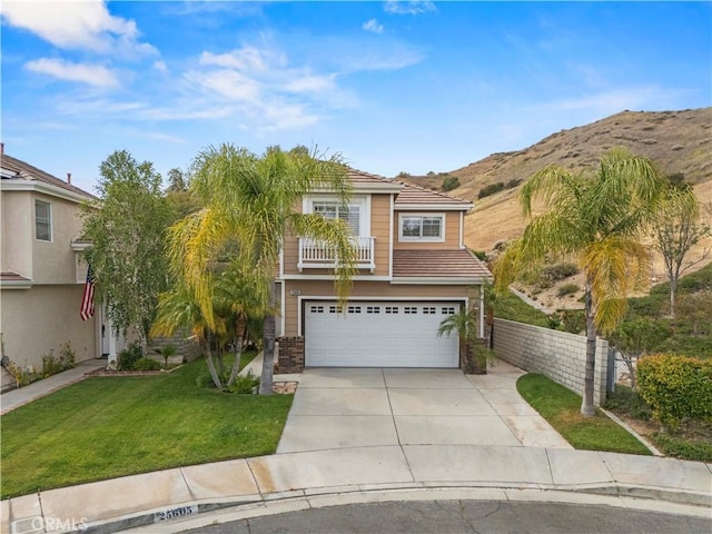 25605 Wordsworth Ln, Stevenson Ranch, CA 91381 - view of front of house featuring driveway, a garage, and a mountain view