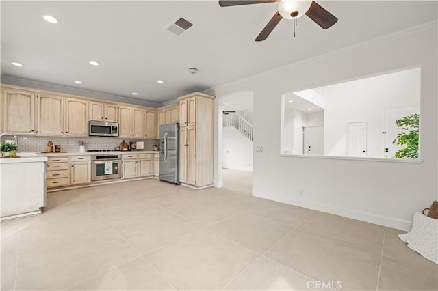 25605 Wordsworth Ln, Stevenson Ranch, CA 91381 - kitchen featuring stainless steel appliances, light brown cabinets, crown molding, ceiling fan, and light countertops