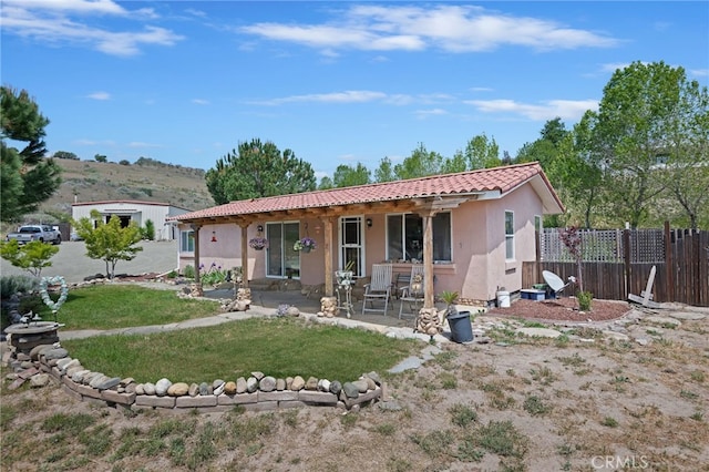 655 Bobcat Springs Rd, Buellton, CA 93427 - back of property with stucco siding, a patio, and a tiled roof