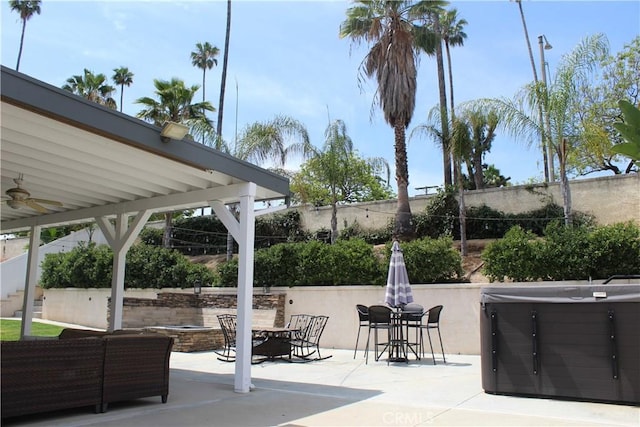 1338 Coral Gables Cir, Corona, CA 92881 - view of patio / terrace featuring a hot tub, a fire pit, and ceiling fan