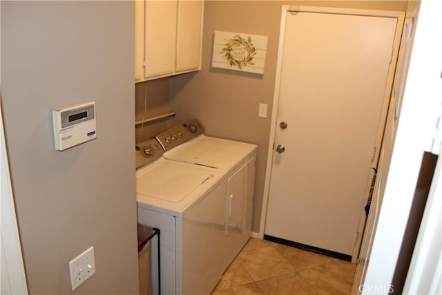 1338 Coral Gables Cir, Corona, CA 92881 - laundry room featuring washing machine and dryer, cabinet space, and light tile patterned floors