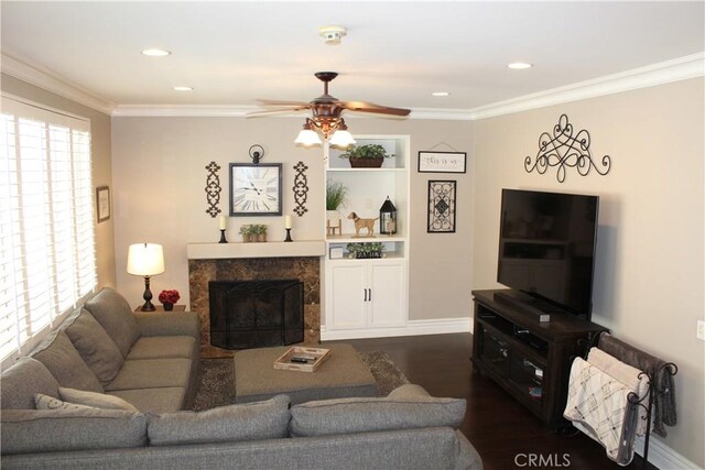 1338 Coral Gables Cir, Corona, CA 92881 - living room featuring ceiling fan, a high end fireplace, dark wood finished floors, crown molding, and recessed lighting