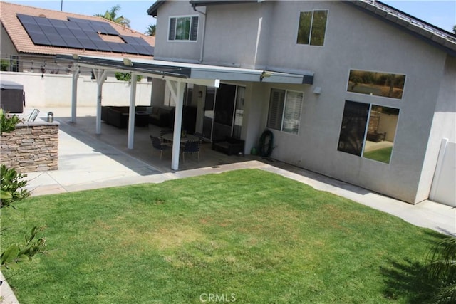 1338 Coral Gables Cir, Corona, CA 92881 - back of property with stucco siding, a patio area, and an outdoor hangout area