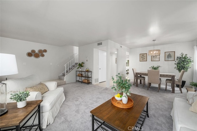 4057 Via Encinas, Cypress, CA 90630 - living area with light colored carpet, stairs, and a chandelier