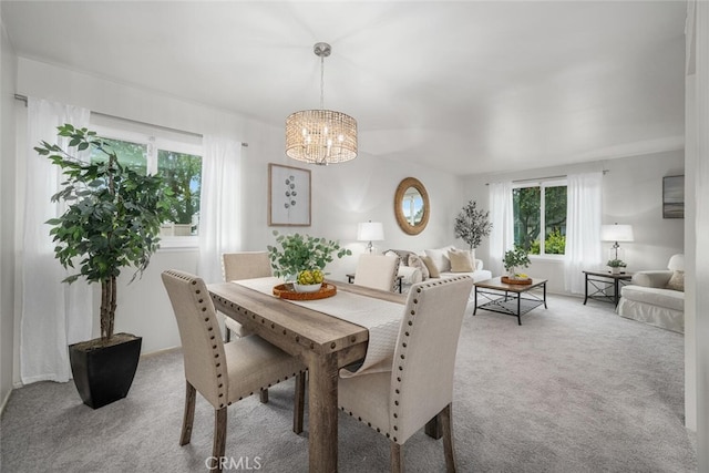 4057 Via Encinas, Cypress, CA 90630 - dining area featuring carpet flooring, healthy amount of natural light, and a chandelier