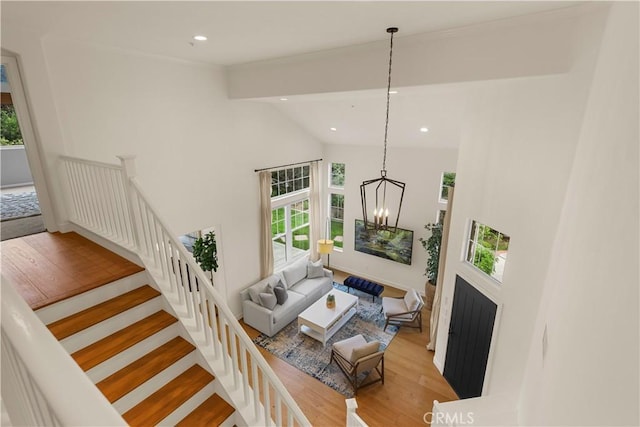 1641 Via Tulipan, San Clemente, CA 92673 - living room with healthy amount of natural light, a chandelier, recessed lighting, wood finished floors, and beam ceiling