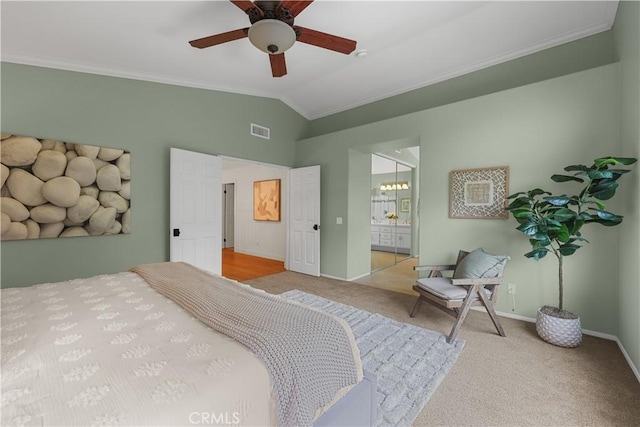 1641 Via Tulipan, San Clemente, CA 92673 - bedroom featuring crown molding, lofted ceiling, carpet floors, baseboards, and connected bathroom