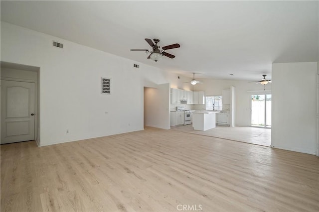 29582 Toomas Cir, Menifee, CA 92587 - unfurnished living room featuring a ceiling fan, light wood-style floors, a sink, and baseboards
