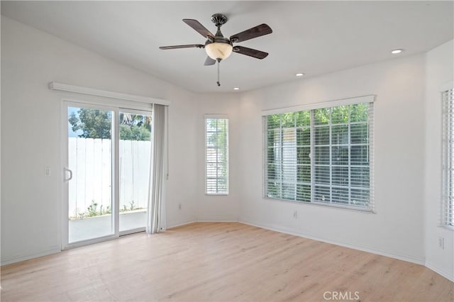 29582 Toomas Cir, Menifee, CA 92587 - spare room featuring healthy amount of natural light, light wood-style flooring, ceiling fan, baseboards, and recessed lighting