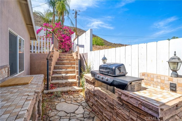 29582 Toomas Cir, Menifee, CA 92587 - view of patio / terrace featuring area for grilling and stairs