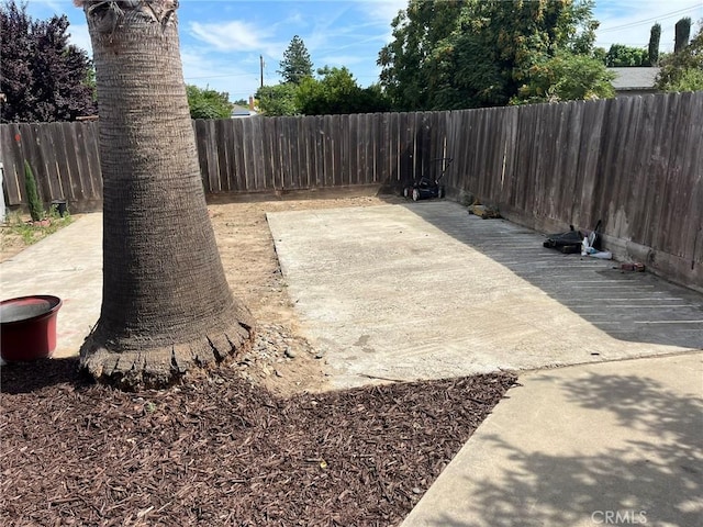 1881 Mitchell, Atwater, CA 95301 - fenced backyard featuring a patio area