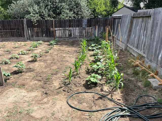 1881 Mitchell, Atwater, CA 95301 - fenced backyard featuring a garden