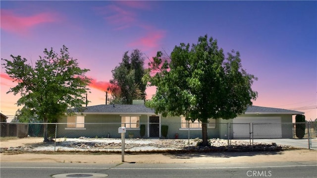 21861 Ramona Ave, Apple Valley, CA 92307 - ranch-style house with a fenced front yard, concrete driveway, and a garage