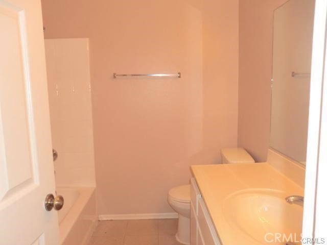 37901 Rosemarie St, Palmdale, CA 93550 - full bath with toilet, vanity, tile patterned flooring, baseboards, and shower / bathtub combination