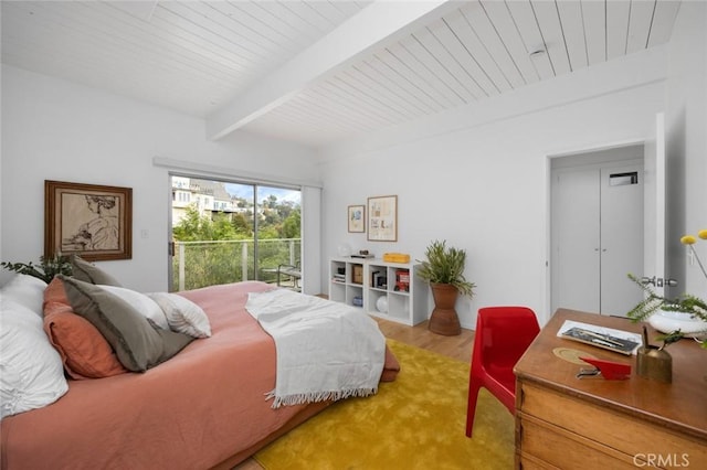 3102 Durand Dr, Los Angeles, CA 90068 - bedroom with access to exterior, wood finished floors, and wooden ceiling with exposed beams