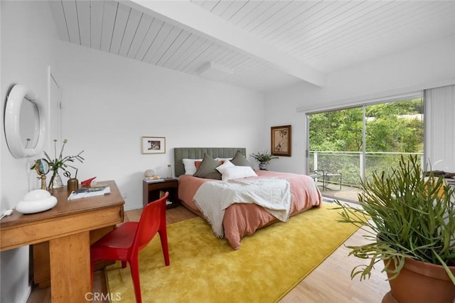 3102 Durand Dr, Los Angeles, CA 90068 - bedroom with beam ceiling, access to outside, and wood finished floors