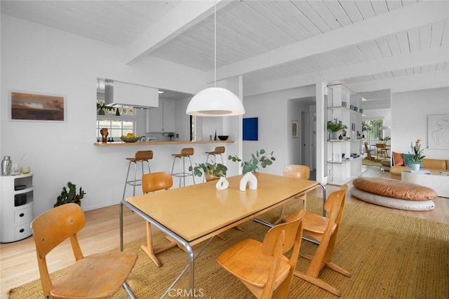 3102 Durand Dr, Los Angeles, CA 90068 - dining room featuring light wood-style floors and wood ceiling with exposed beams
