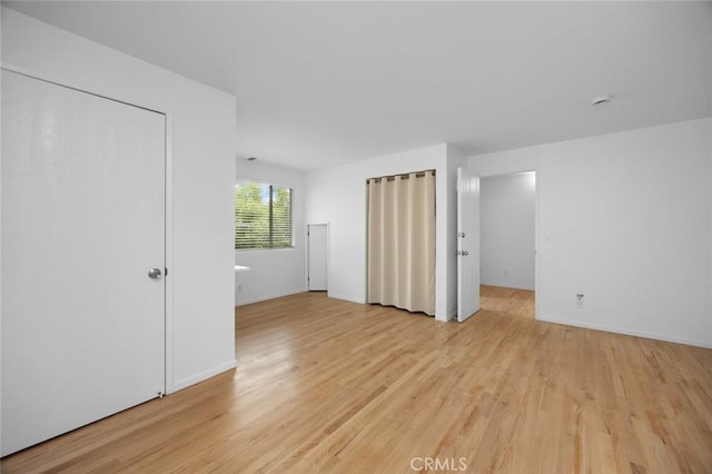 3102 Durand Dr, Los Angeles, CA 90068 - spare room with light wood-type flooring and baseboards