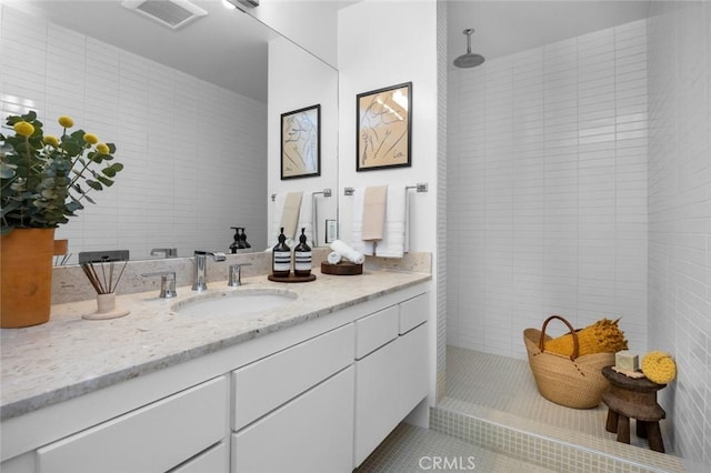 3102 Durand Dr, Los Angeles, CA 90068 - bathroom with vanity, a walk in shower, tile patterned flooring, and tile walls