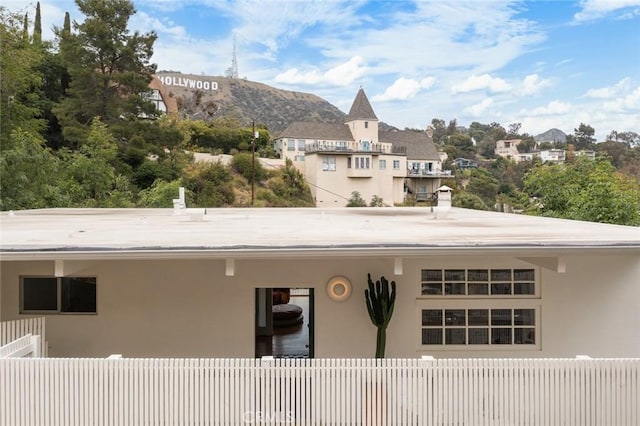3102 Durand Dr, Los Angeles, CA 90068 - rear view of property with stucco siding and a mountain view