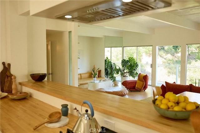 3102 Durand Dr, Los Angeles, CA 90068 - dining area with wood finished floors and beam ceiling