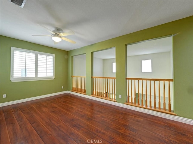 8242 Daisy Ln, Riverside, CA 92508 - unfurnished room with ceiling fan, hardwood / wood-style flooring, and baseboards