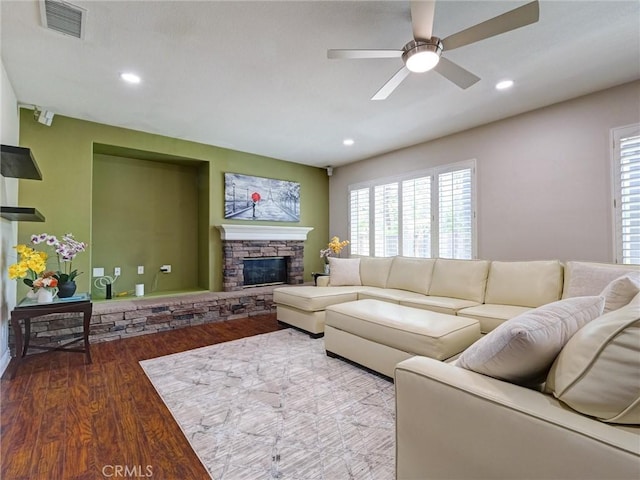 8242 Daisy Ln, Riverside, CA 92508 - living area with wood finished floors, a ceiling fan, plenty of natural light, recessed lighting, and a fireplace