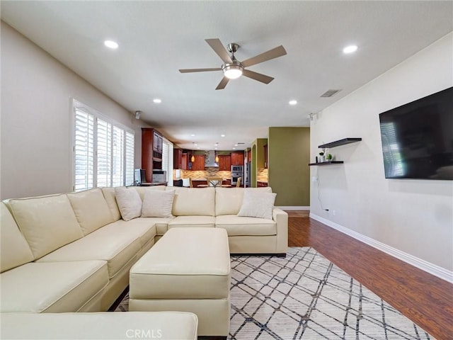 8242 Daisy Ln, Riverside, CA 92508 - living room with recessed lighting, ceiling fan, baseboards, and light wood-type flooring