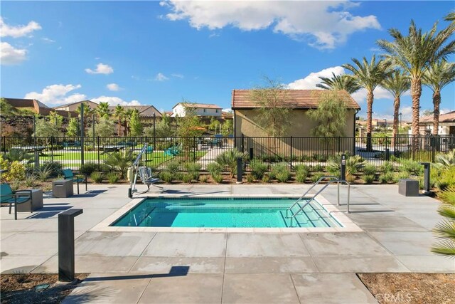 14226 Sonoma Ct, Beaumont, CA 92223 - view of pool with a pool, a patio area, and a residential view