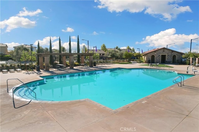 14226 Sonoma Ct, Beaumont, CA 92223 - community pool featuring a patio area
