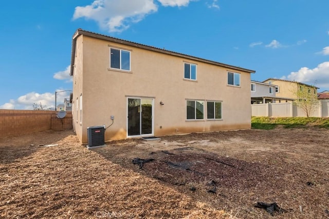 14226 Sonoma Ct, Beaumont, CA 92223 - back of property with stucco siding, central air condition unit, and a fenced backyard