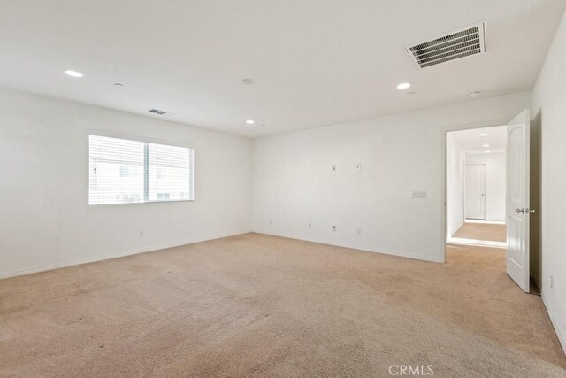 14226 Sonoma Ct, Beaumont, CA 92223 - unfurnished room with light carpet, recessed lighting, and baseboards